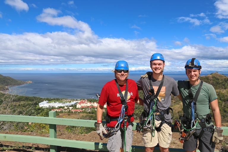 Mike Simons & friends wearing zipline gear in Costa Rica