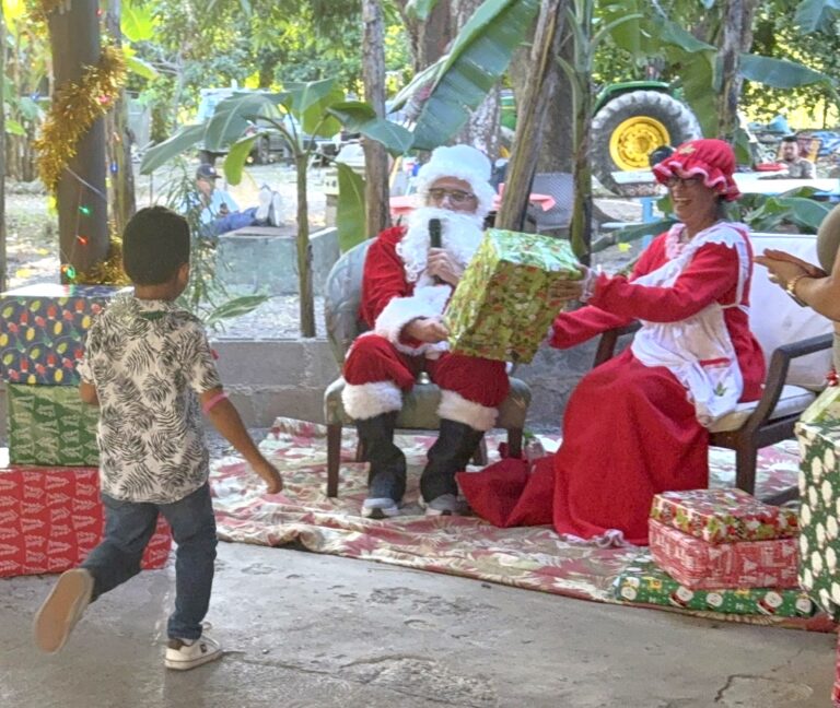SANTA CAME bearing a mountain of Toys for Tots this year